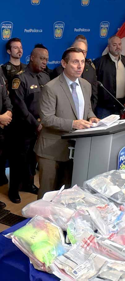 Mayor Brown at a Peel Regional Police announcement with seized drugs on display